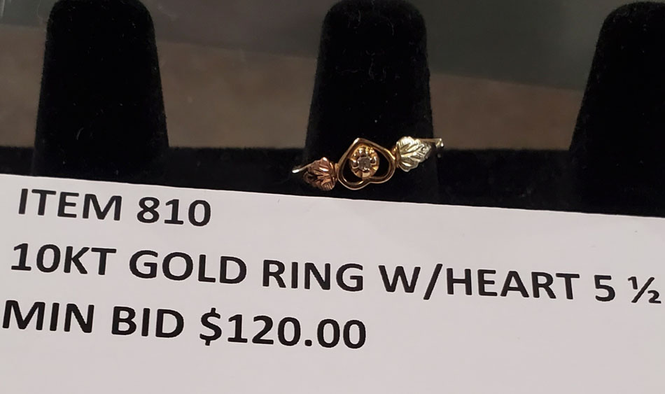 Gold ring with heart