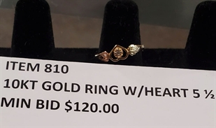 Gold ring with heart